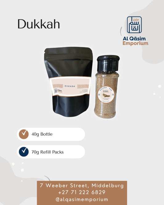 Dukkah packaging with a black and white bag and a glass container, branded by Al Qasim Emporium.